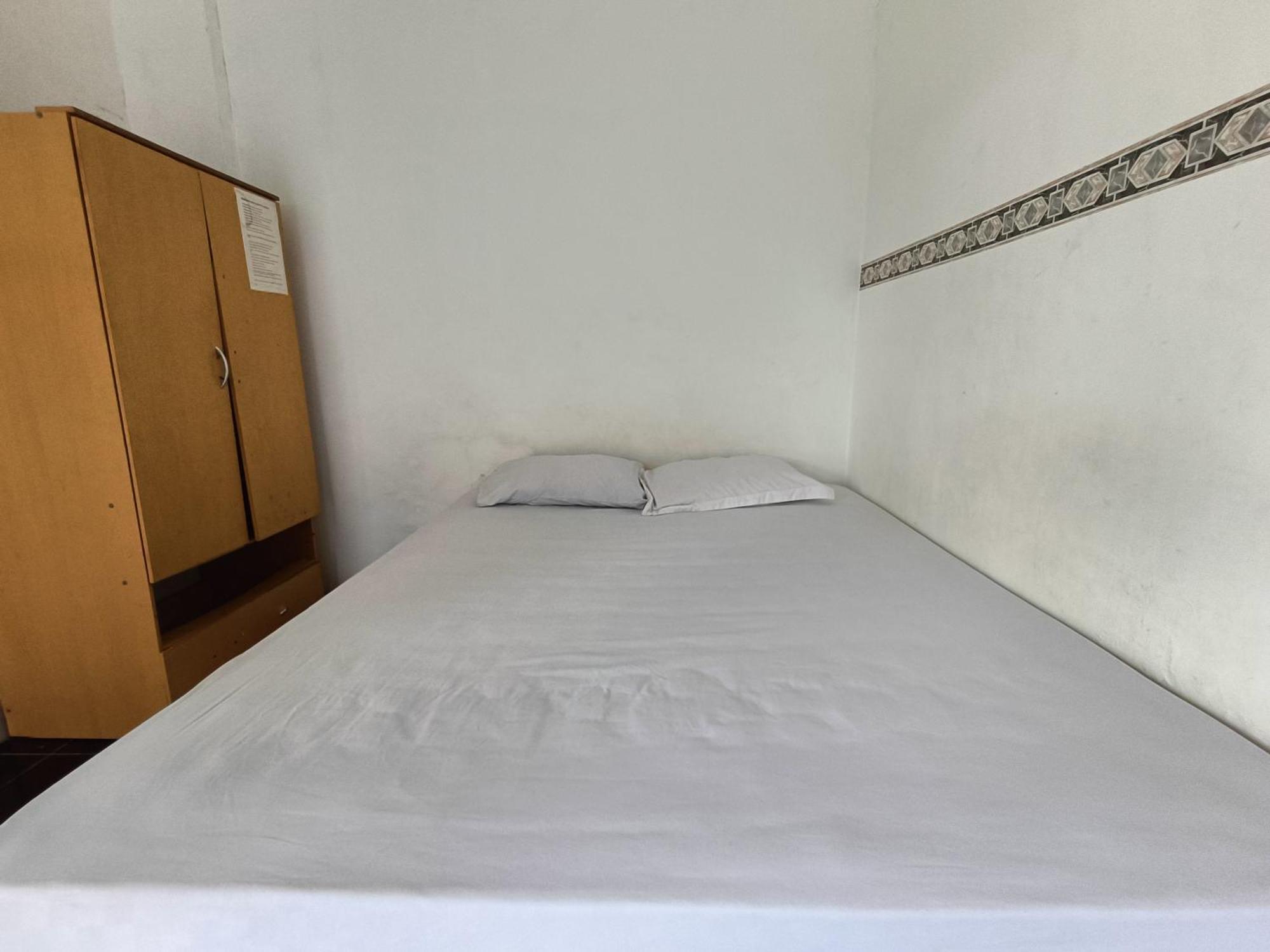 Bumi Merpati Residence Makassar Mitra Reddoorz Esterno foto