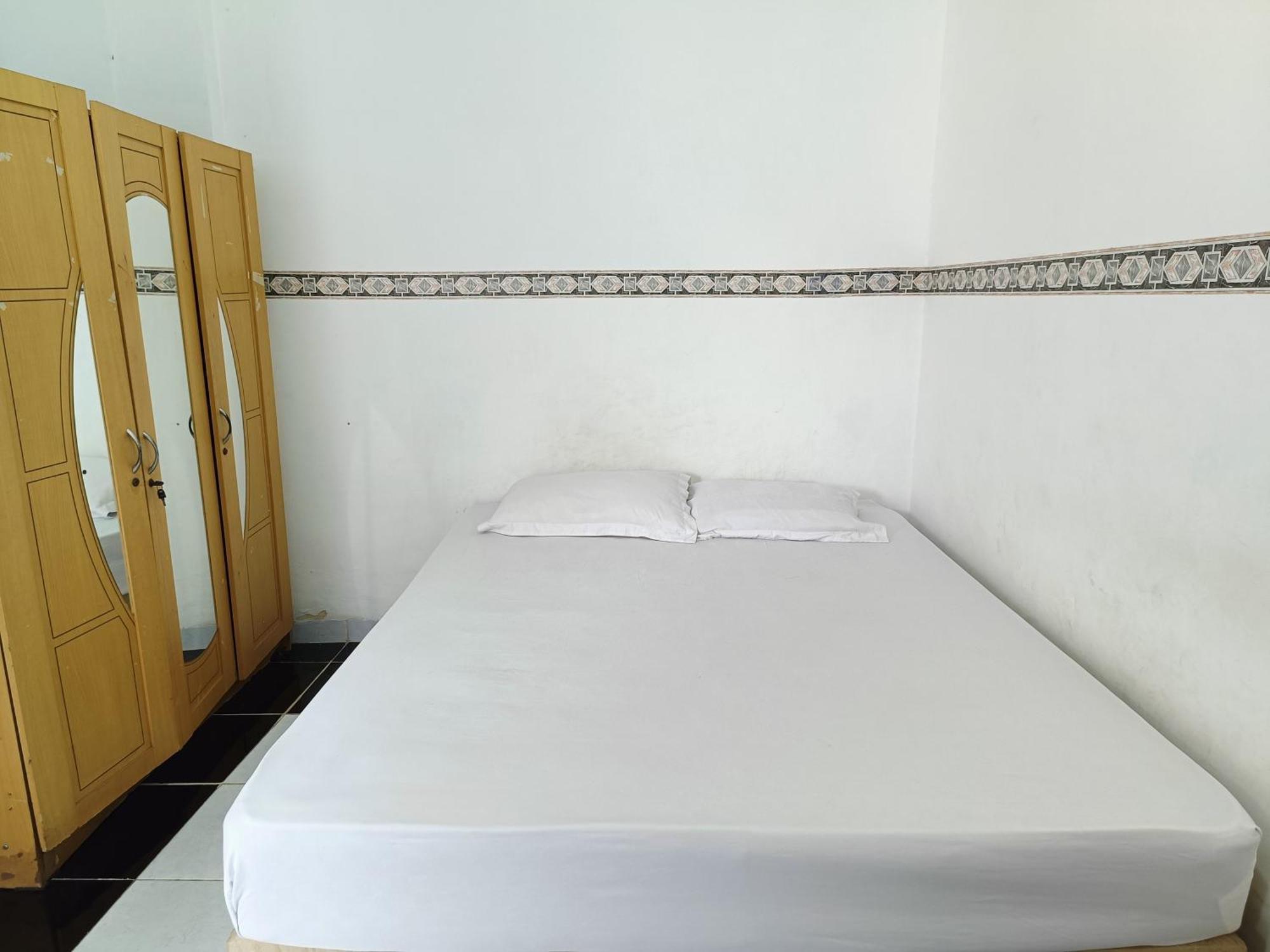 Bumi Merpati Residence Makassar Mitra Reddoorz Esterno foto