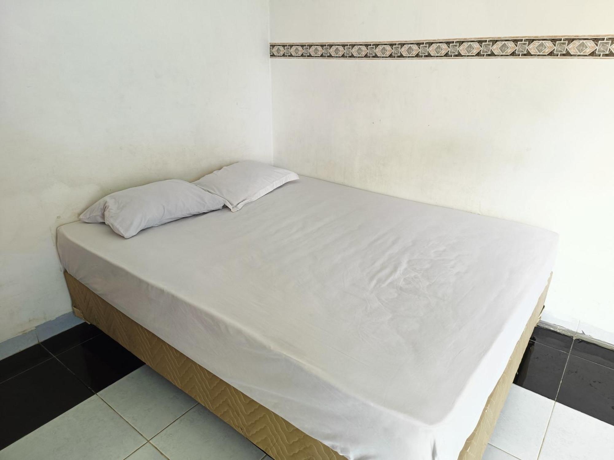 Bumi Merpati Residence Makassar Mitra Reddoorz Esterno foto