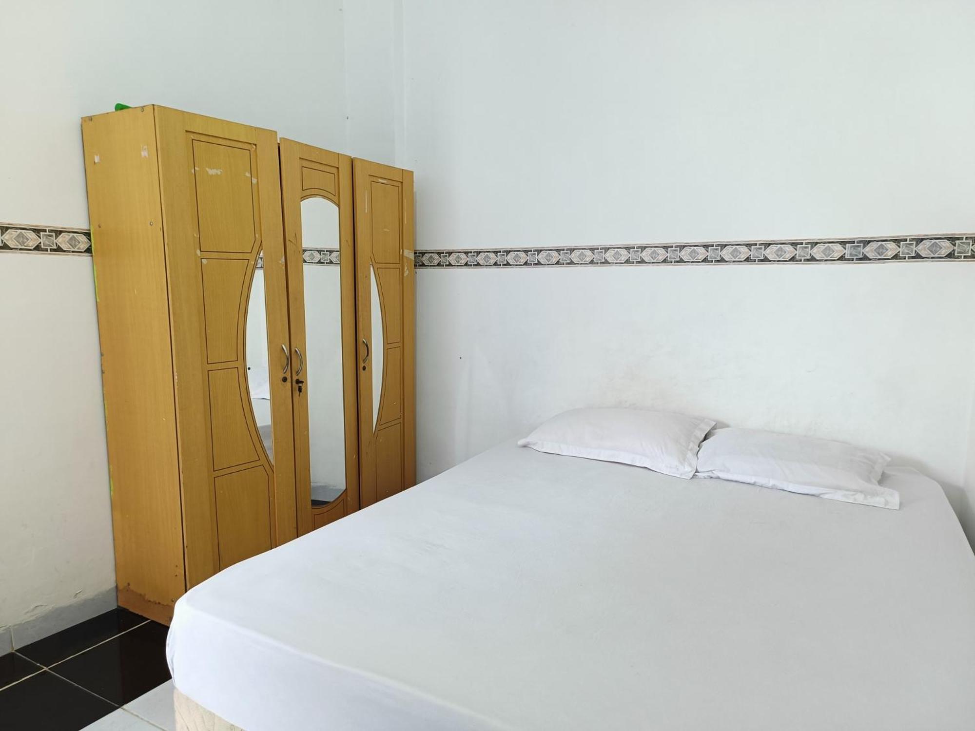 Bumi Merpati Residence Makassar Mitra Reddoorz Esterno foto