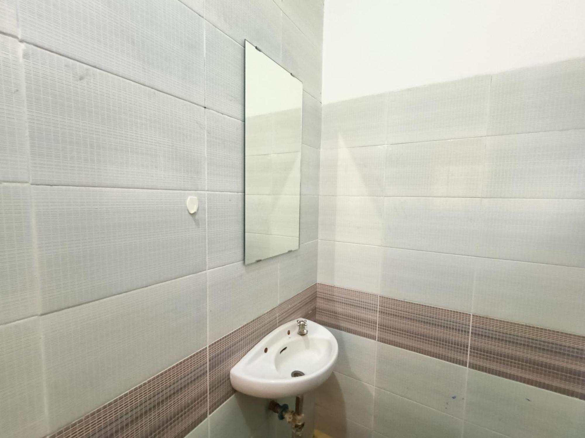 Bumi Merpati Residence Makassar Mitra Reddoorz Esterno foto
