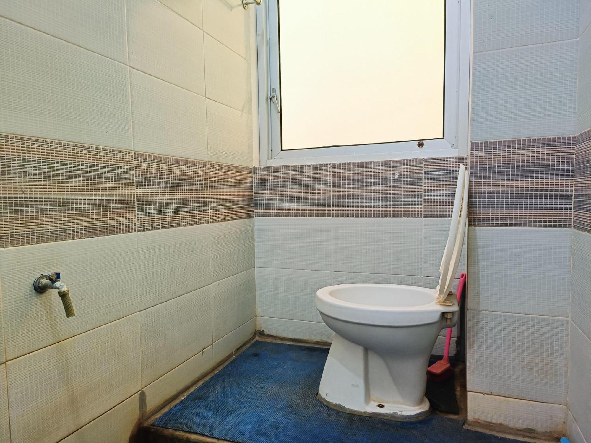 Bumi Merpati Residence Makassar Mitra Reddoorz Esterno foto