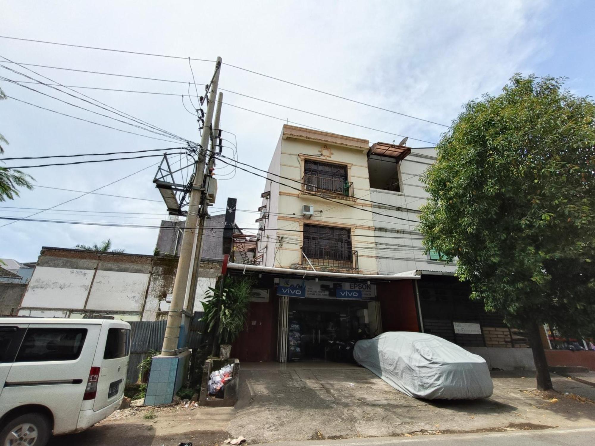 Bumi Merpati Residence Makassar Mitra Reddoorz Esterno foto