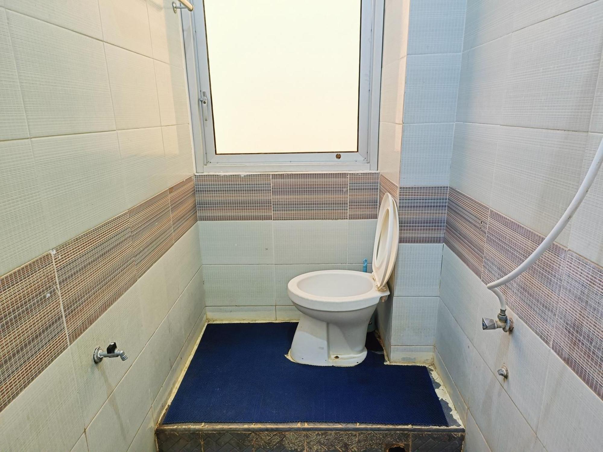Bumi Merpati Residence Makassar Mitra Reddoorz Esterno foto